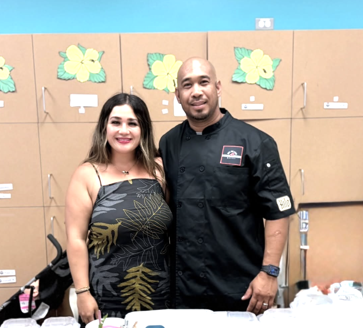 Kai and Evan, owners of Big Island Smokehouse, at a catering event in Hilo, Hawai'i